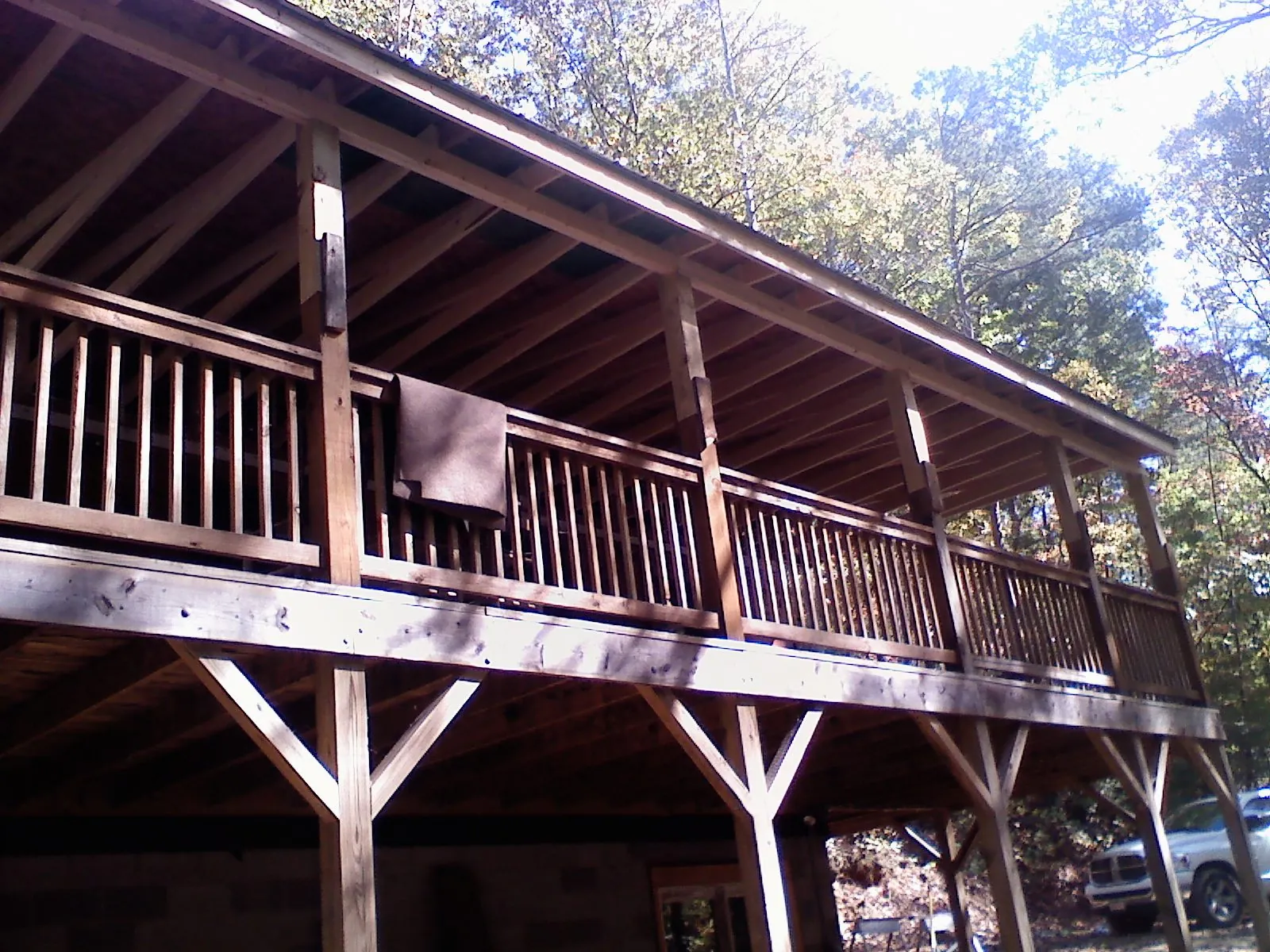 Timber framing under a new elevated porch and deck — Roof Leak Repair in Riverton by Roofing Brothers